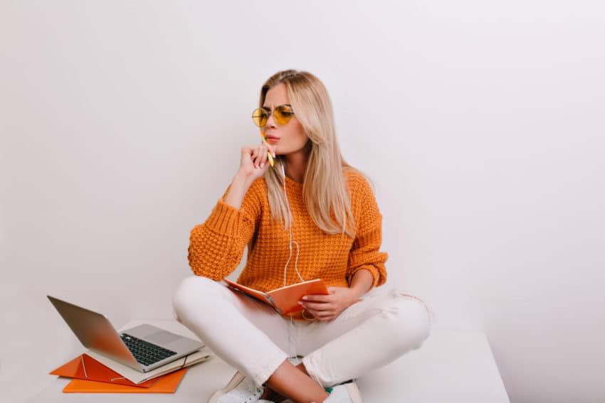 woman thinking on computer