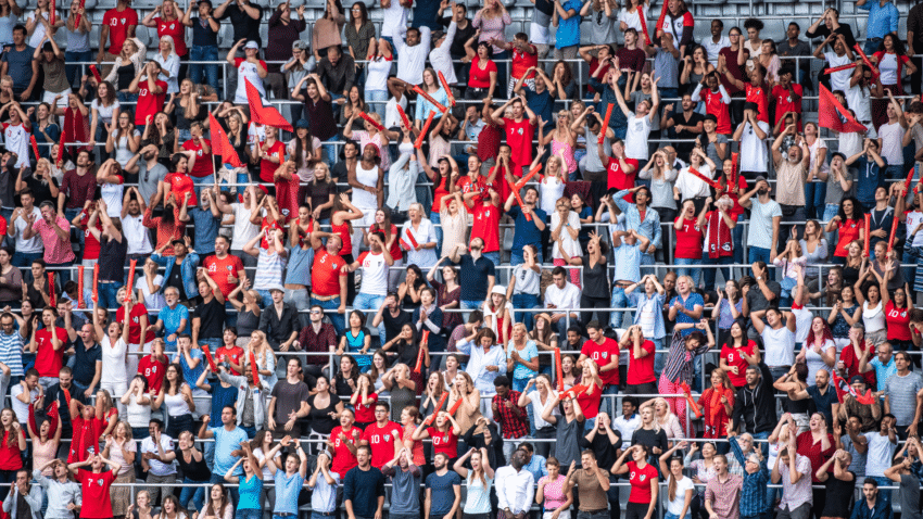 travel business development crowd-watching-sports