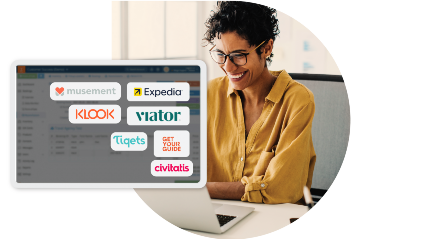Women looking at Rezgo on computer and seeing all the OTAs that are available